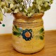 Pot en terre beige motif floral