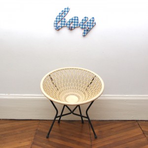 Off-white plastic armchair