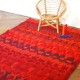 Tapis rouge ancien