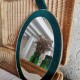 Miroir ovale en velours grosse côtes vertes